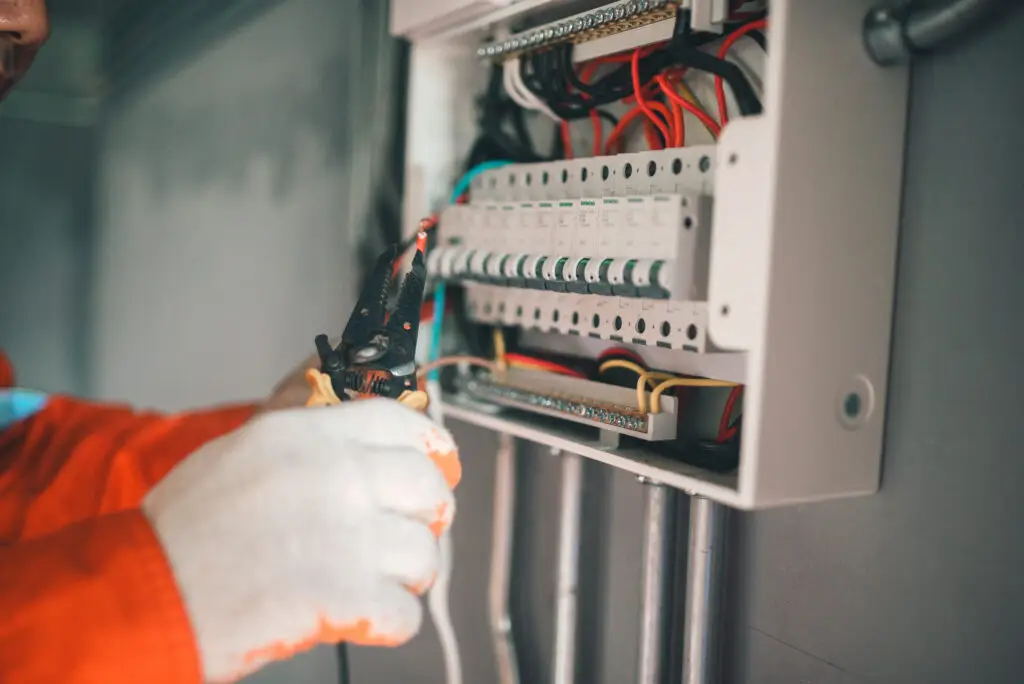 Electrical fault finding electrician diagnosing a consumer unit fault in Barnet